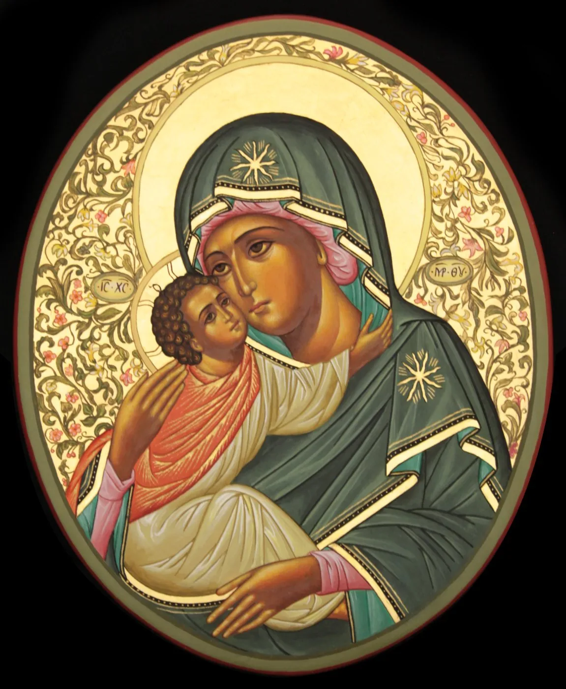 Oval icon of the Virgin of Tenderness on gold ground